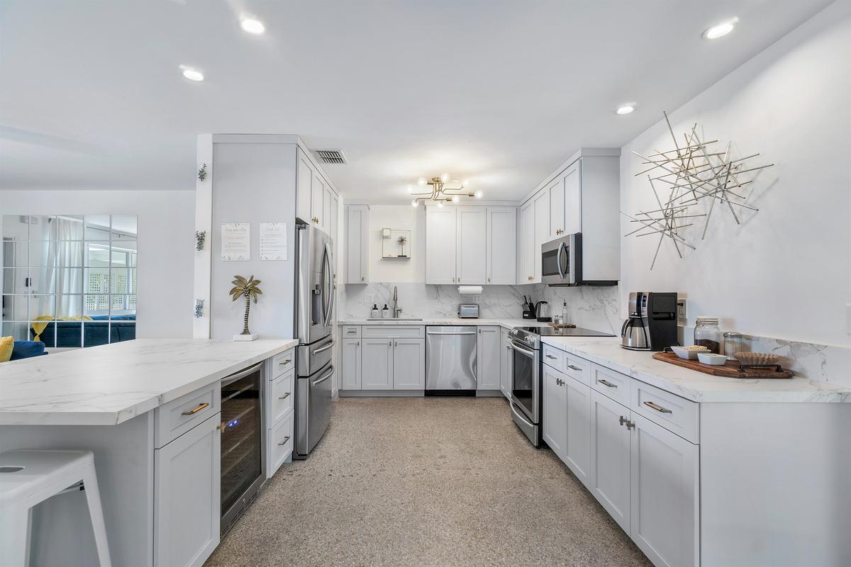 Kitchen w/ smart appliances & wine cooler