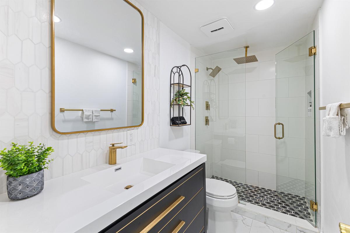 Primary bathroom — bright, clean, and spa-inspired.