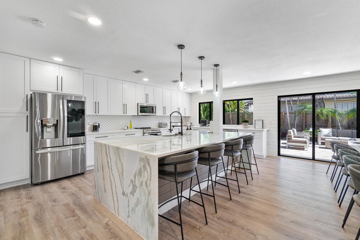 Enjoy breakfast on the marble countertops